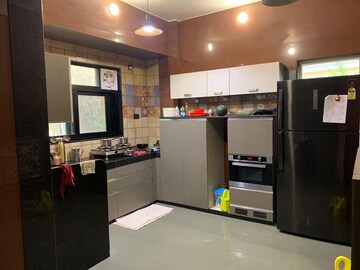 Kitchen in 4 BHK Villa at Cosmos Hawaiian Village, Ghodbunder Road – for Sale
