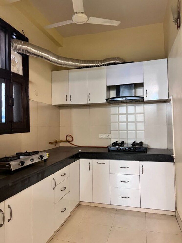 Kitchen, super-mig 2 Bedroom 112 Sq.Mt. Builder Floor In Sector 105 Noida 9867705