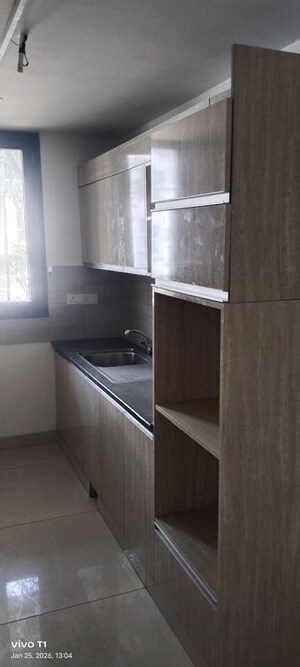 Kitchen in 3.5 BHK Builder Floor at Ansal API Esencia, Sector 67 – for Rent