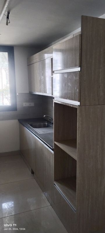 Kitchen in 3.5 BHK Builder Floor at Ansal API Esencia, Sector 67 – for Rent