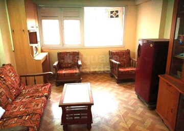 Living Room in 1 BHK Apartment at Amisha CHS, Dahisar West – for Rent