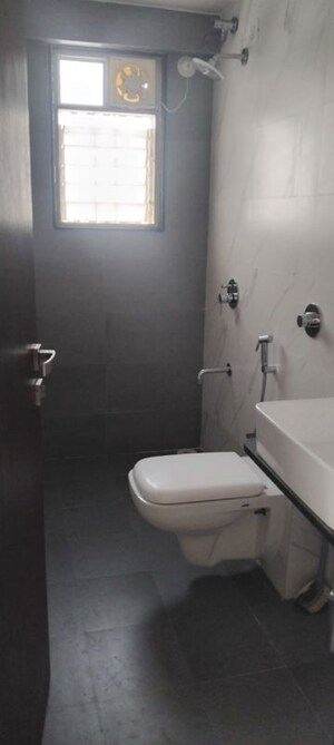 Bathroom in 2 BHK Apartment at Paradigm Shree Sneh, Aundh – for Rent