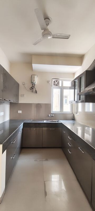 Kitchen in 3.5 BHK Builder Floor at Emaar MGF Emerald Hills, Sector 65 – for Rent