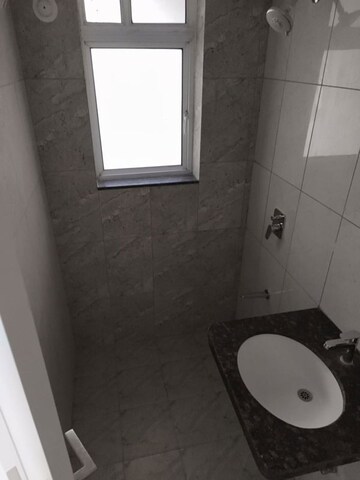 Bathroom in 3 BHK Apartment at Godrej Boulevard Manjri, Manjari – for Rent