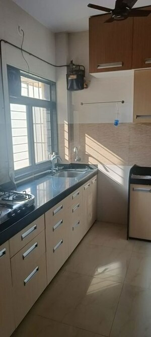 Kitchen in 2 BHK Apartment at Sukur Residency B1 CHS Ltd, Kasarvadavali – for Rent