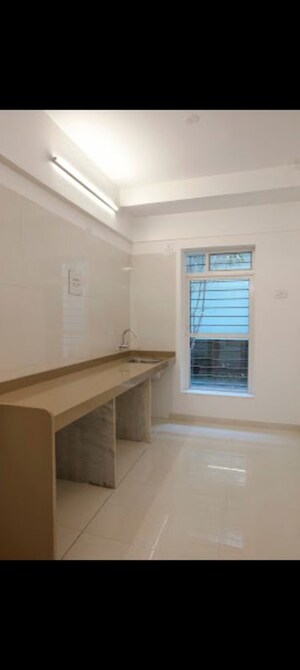 Kitchen in 1 BHK Apartment at Dosti West County, Balkum Pada – for Sale