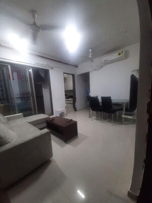 Living Room in 2 BHK Apartment at Runwal Eirene, Balkum Pada – for Rent