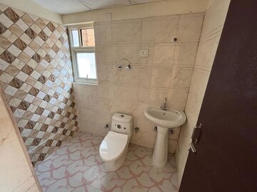 Bathroom in 2 BHK Apartment at Nilaya Greens, Raj Nagar Extension – for Rent