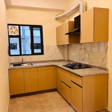 Kitchen in 3 BHK Apartment at Suncity Vatsal Valley, Gwal Pahari – for Rent