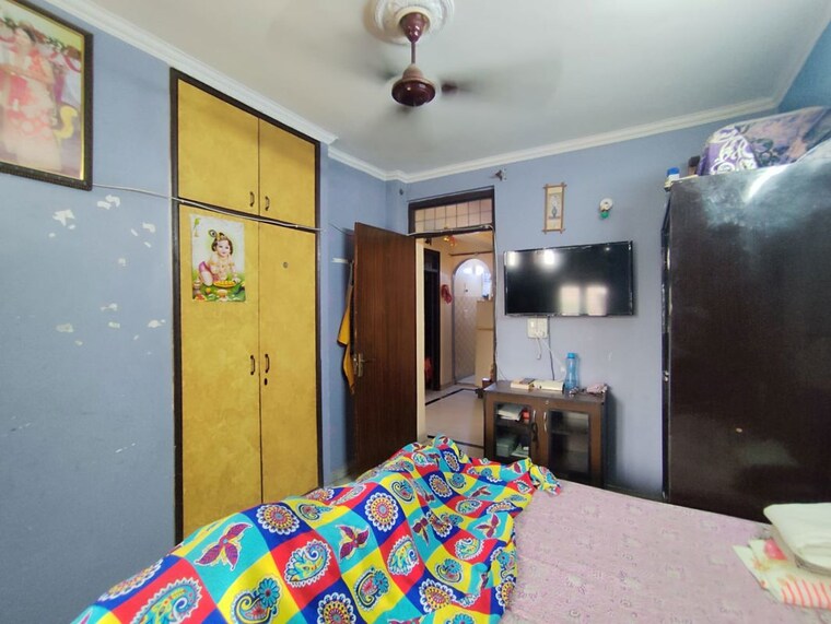 Bedroom, sangam vihar 2 Bedroom 90 Sq.Yd. Builder Floor In Sangam Vihar Delhi 9869991
