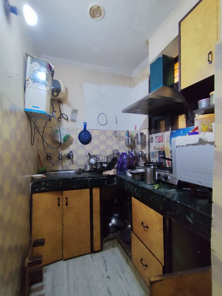 Kitchen, sangam vihar 2 Bedroom 100 Sq.Yd. Builder Floor In Sangam Vihar Delhi 9870037