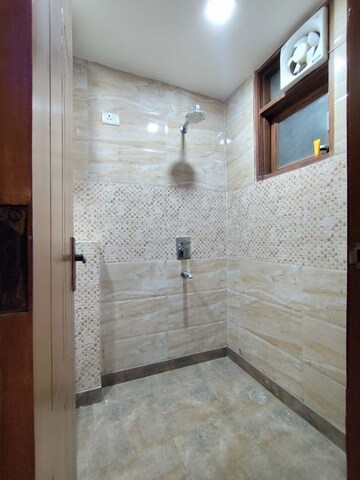 Bathroom in 2 BHK Builder Floor at Sangam Vihar – for Sale