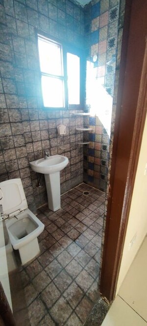 Bathroom in 3 BHK Builder Floor at Lake View Complex, Dhakoli – for Rent