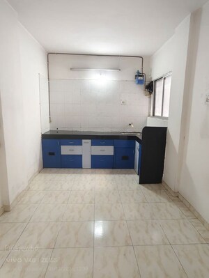 Kitchen in 2 BHK Apartment at Kumar Padmalaya, Aundh – for Sale