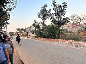 Plot Area in  Industrial Plot at MNR Complex, Peenya – for Sale