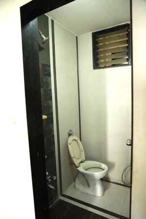 Bathroom in 2 BHK Apartment at Chanakyapuri – for Rent