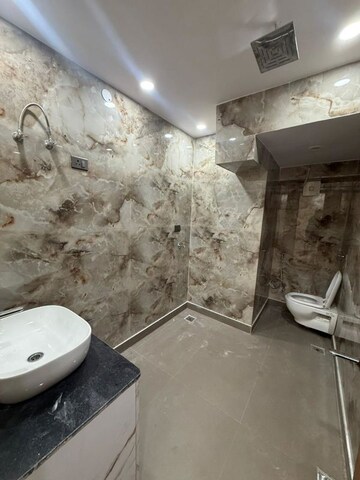 Bathroom in 3 BHK Apartment at Paschim Vihar – for Rent