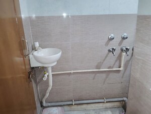 Bathroom in 3 BHK Apartment at Paschim Vihar – for Rent