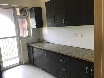Kitchen in 3.5 BHK Apartment at DLF New Town Heights I, Sector 90 – for Sale