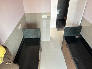 Kitchen in 2 BHK Apartment at Acme Avenue, Kandivali West – for Sale
