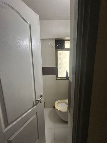 Bathroom in 1 BHK Apartment at Gundecha Builders Valley Of Flowers, Kandivali East – for Rent