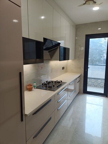 Kitchen in 4 BHK Builder Floor at Ansal API Esencia, Sector 67 – for Rent