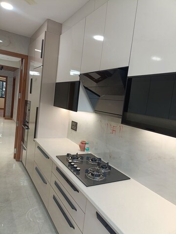 Kitchen in 4 BHK Builder Floor at Ansal API Esencia, Sector 67 – for Rent