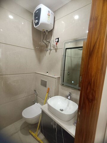 Bathroom in 4 BHK Builder Floor at Ansal API Esencia, Sector 67 – for Rent