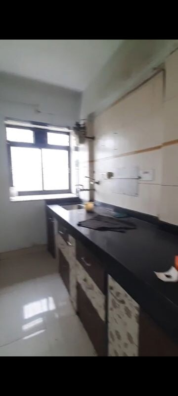 Kitchen in 3 BHK Apartment at Cosmos Regency Kavesar, Kavesar – for Rent