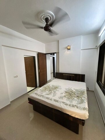 Bedroom in 3 BHK Apartment at Gujrati CHS, Vile Parle East – for Rent