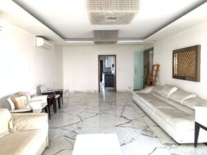 Living Room in 6 BHK Apartment at Oberoi Sky Gardens, Andheri West – for Sale