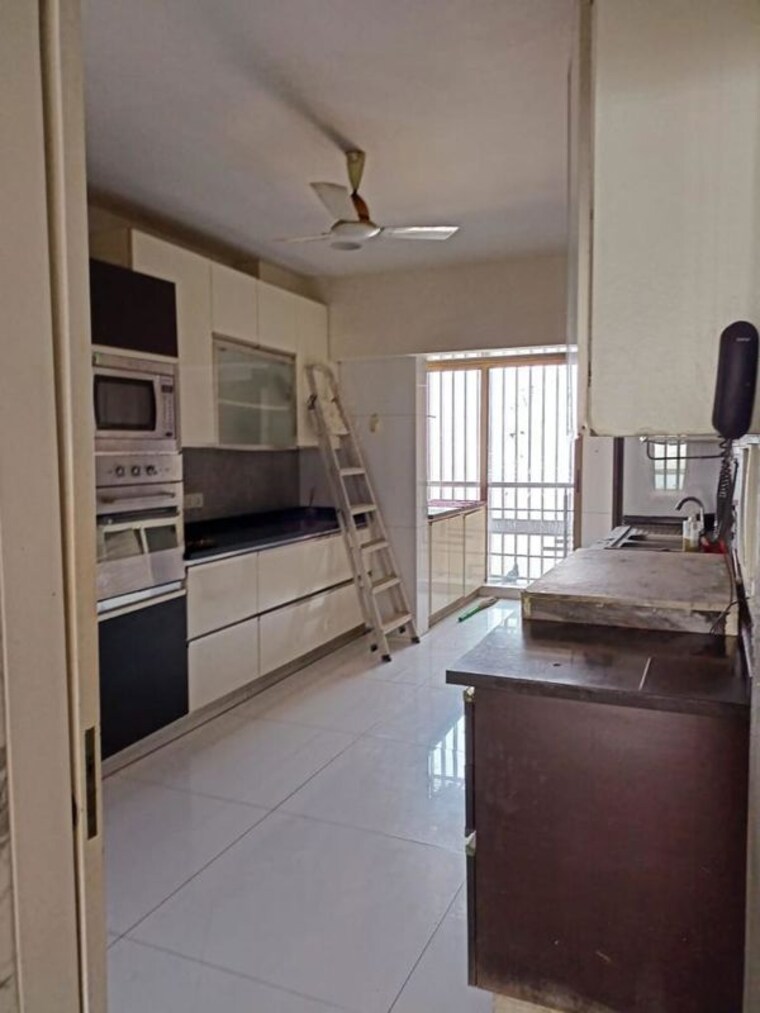 Kitchen, oberoi-sky-gardens 6 Bedroom 4000 Sq.Ft. Apartment In Andheri West Mumbai 9870784