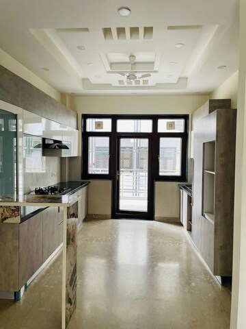 Kitchen in 4 BHK Builder Floor at Ansal API Esencia, Sector 67 – for Rent