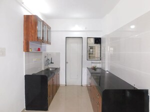 Kitchen in 2 BHK Apartment at Shree Ganesh Graceland, Pimple Saudagar – for Rent