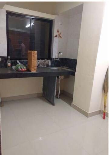Kitchen in 2 BHK Apartment at Patil Raghukul Nagari CHS, Bopodi – for Rent