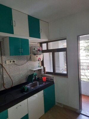 Kitchen in 1 BHK Apartment at Viman Nagar – for Sale