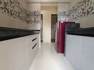 Kitchen in 2 BHK Apartment at Ashar Axis, Majiwada – for Rent