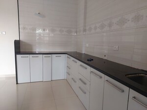 Kitchen in 3.5 BHK Apartment at Venkatesh Flora Phase II, Mundhwa – for Rent