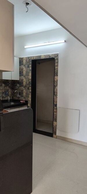 Building Lobby in 2 BHK Apartment at Cosmos Jewels Solitaire, Ghodbunder Road – for Rent