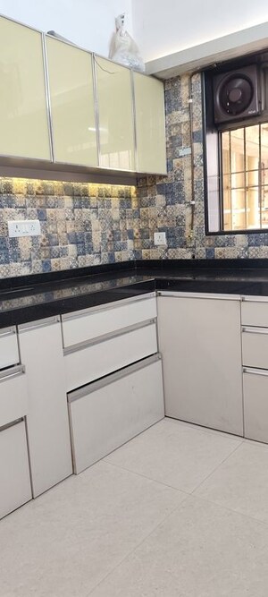 Kitchen in 2 BHK Apartment at Cosmos Jewels Solitaire, Ghodbunder Road – for Rent