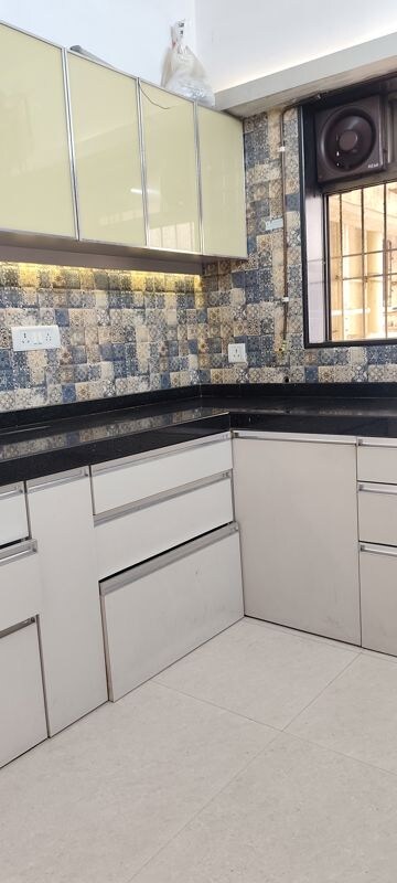 Kitchen in 2 BHK Apartment at Cosmos Jewels Solitaire, Ghodbunder Road – for Rent