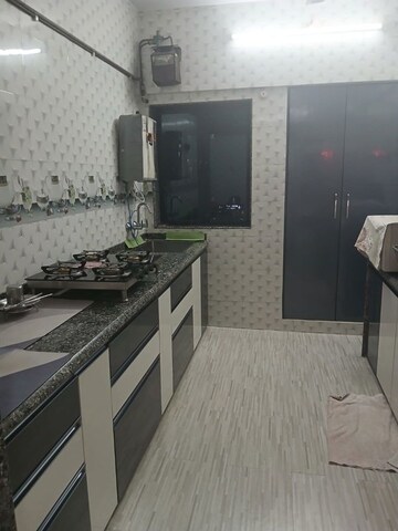 Kitchen in 2 BHK Apartment at New Nandanvan CHS Brahmand, Brahmand – for Sale