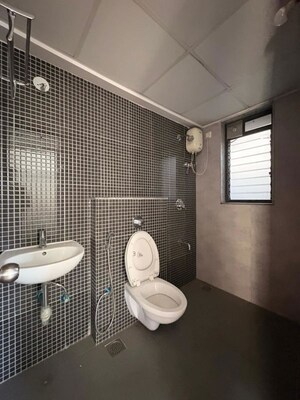 Bathroom in 2 BHK Apartment at Lodha Lakeshore Greens, Dombivli East – for Rent