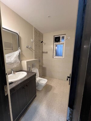 Bathroom in 3 BHK Apartment at ATS Pristine, Sector 150 – for Rent