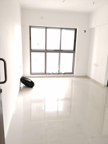 Room in 2 BHK Apartment at IM Applaud 38, Goregaon East – for Rent