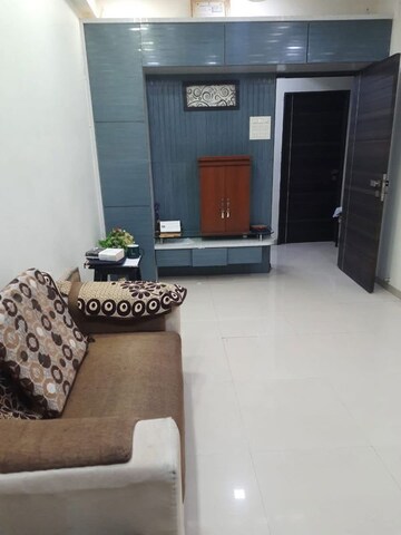 Living Room in 2 BHK Apartment at Rashmi Regency, Nalasopara East – for Rent