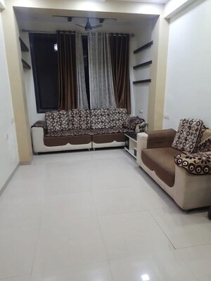 Living Room in 2 BHK Apartment at Rashmi Regency, Nalasopara East – for Rent