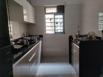 Kitchen in 2 BHK Apartment at Sheth Vasant Oasis, Andheri East – for Rent