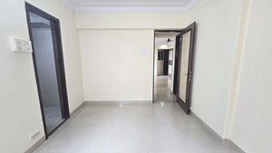 Master Bedroom in 1 BHK Apartment at Agarwal Trinity Towers, Malad West – for Rent