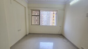 Master Bedroom in 1 BHK Apartment at Agarwal Trinity Towers, Malad West – for Rent